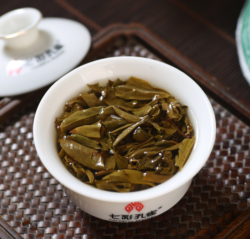 Aged 7520 Seven-Colored Peacock Raw Pu-erh – Complex, Honeyed & Orchid Fragrance