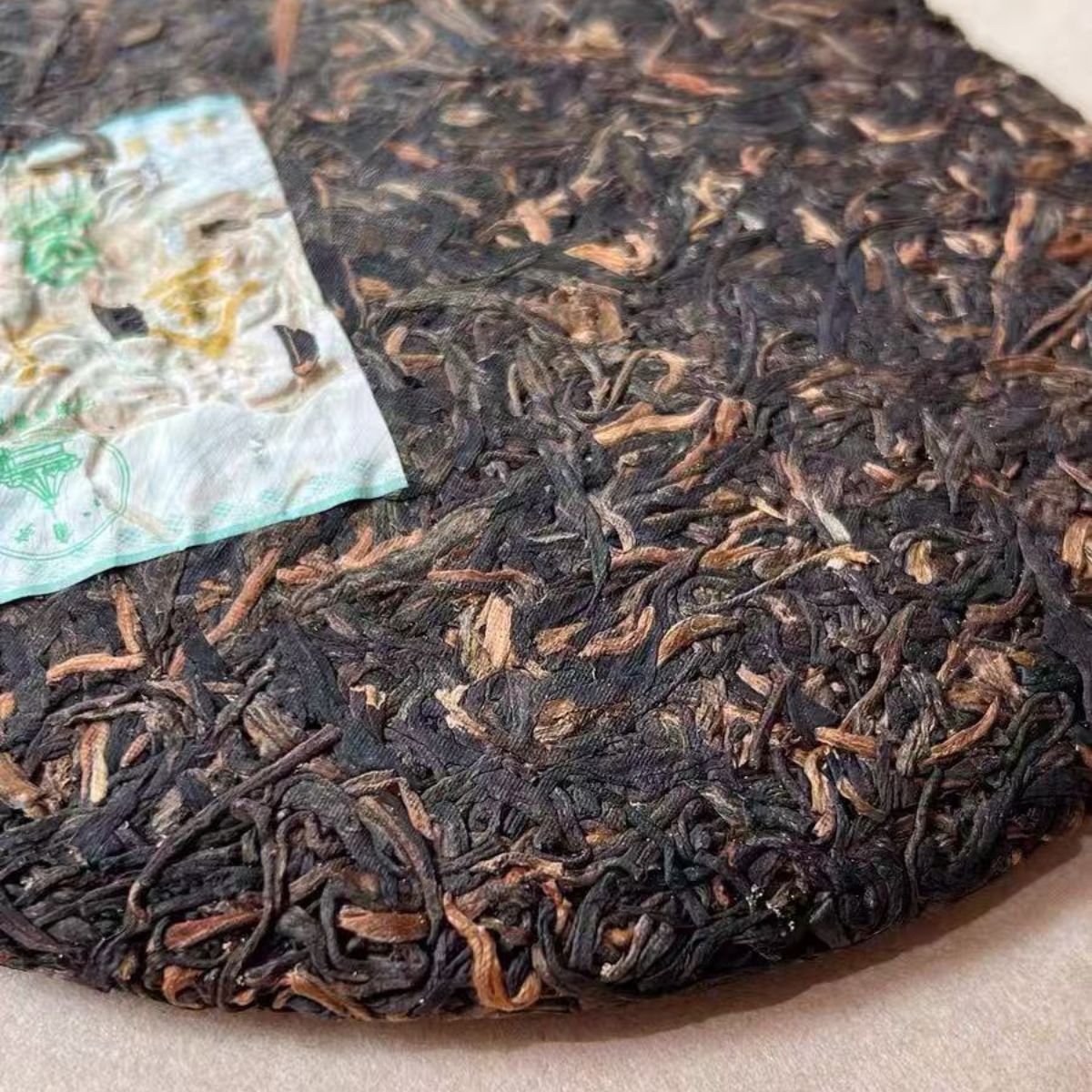 2006 Liming Tea Factory "Golden Peacock" Raw Pu-erh Cake (357g)
