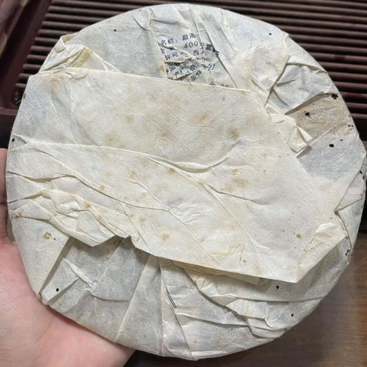 Bajiaoting Golden Needle Tribute Cake Sheng Puerh 2007 - 400g