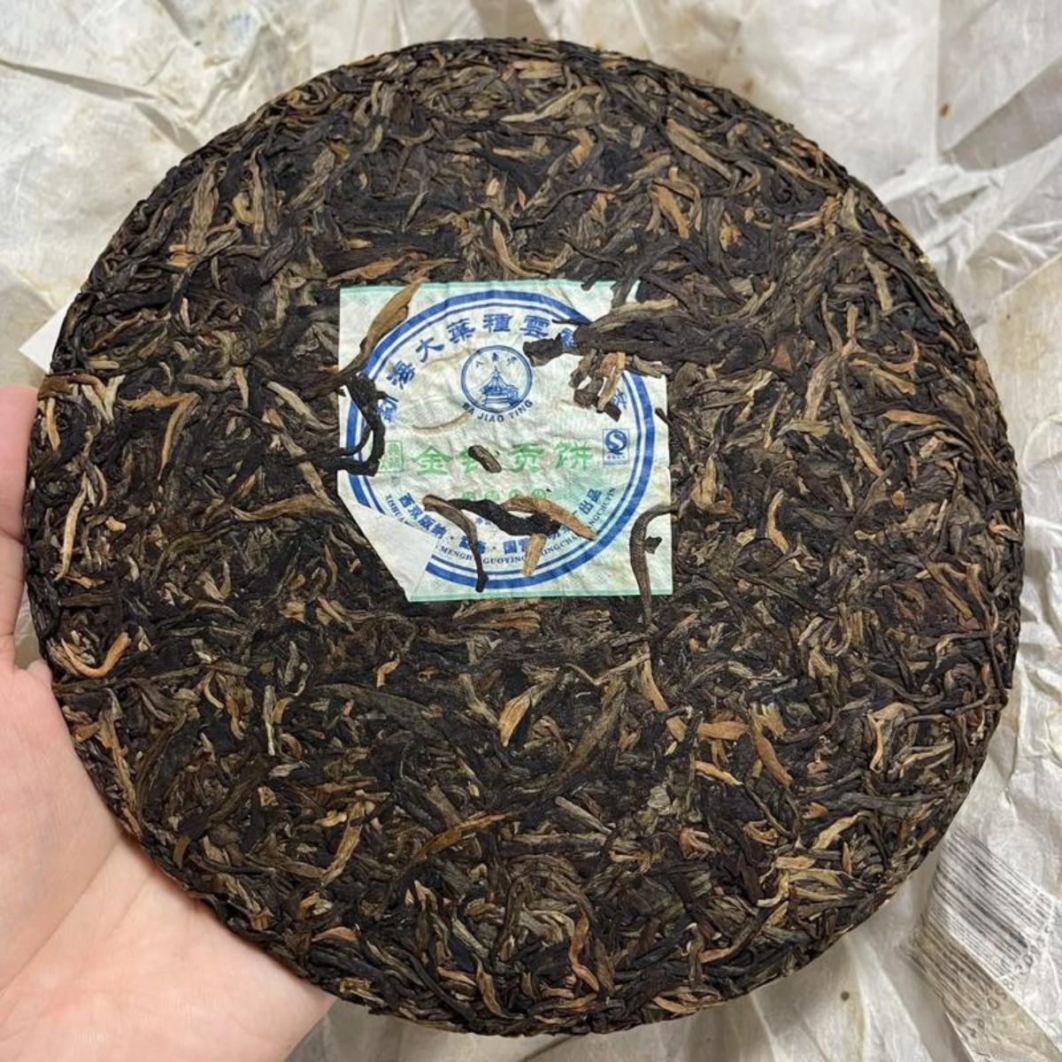 Bajiaoting Golden Needle Tribute Cake Sheng Puerh 2007 - 400g