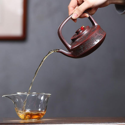 Soaring Bull Spirit Handled Yixing Teapot - Ancient Black Clay 300ml