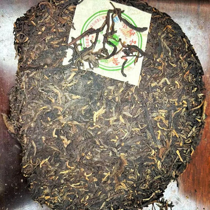 Liming Bajiaoting Ecological Green Cake Sheng Puerh 2006 - 357g