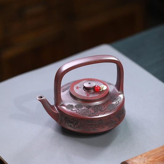 Soaring Bull Spirit Handled Yixing Teapot - Ancient Black Clay 300ml