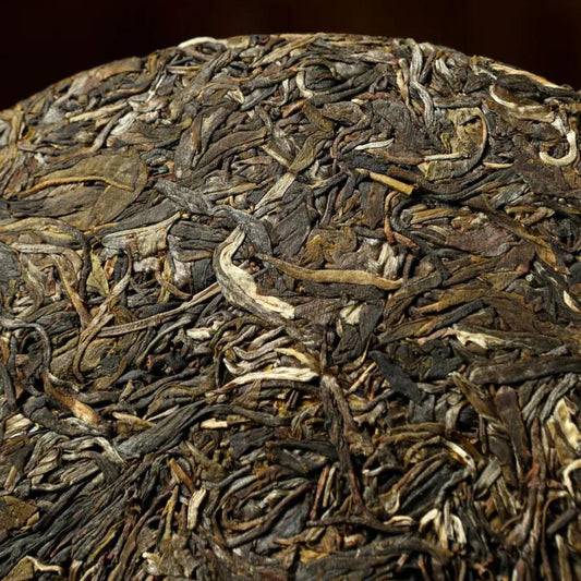 2015 & 2019 Seven-Colored Peacock Raw Pu-erh Tea Cake (357g) – A’Brown Mountain Shengcha