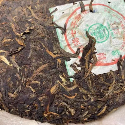 2009 Liming Tea Factory · Ba Jiao Ting 0432 | Aged Raw Pu-erh — 16 Years, Menghai Character, Honey Aroma & Lasting Hui Gan (357g)