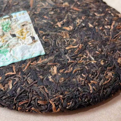2006 Liming Tea Factory "Golden Peacock" Raw Pu-erh Cake (357g)