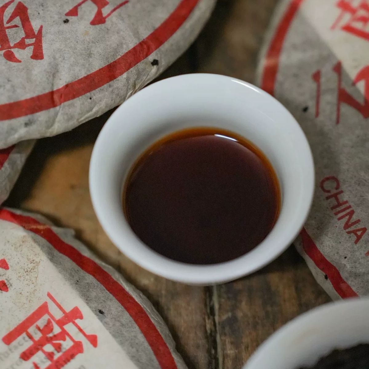 2001 Menghai “Yellow Label” Aged Pu-erh Ripe Tea Cake – Camphor Aroma, Smooth & Rich Finish (357g)