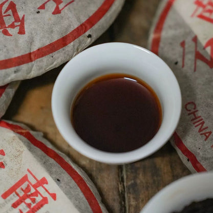 2001 Menghai “Yellow Label” Aged Pu-erh Ripe Tea Cake – Camphor Aroma, Smooth & Rich Finish (357g)