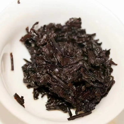 2002 Tongqing Hao Yunnan Ripe Pu-erh Tea Cake | Guangdong Stored Aged Shou Pu-erh 357g