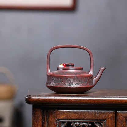 Soaring Bull Spirit Handled Yixing Teapot - Ancient Black Clay 300ml