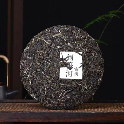 Tong Qing He Ancient Tree Raw Pu-erh Tea Cake 2022 - 357g Xishuangbanna