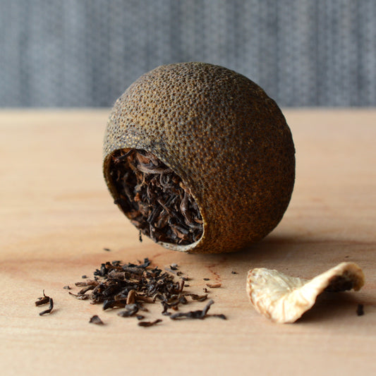 10 years aged Cha Tou Ripe Pu-erh Tea Cured in King Orange Fruit