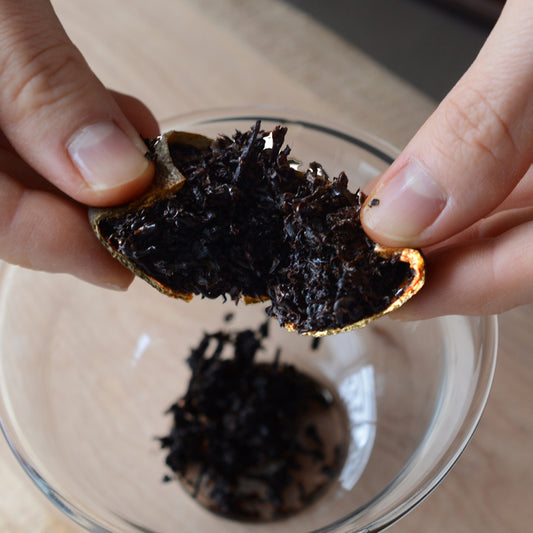 10 years aged Cha Tou Ripe Pu-erh Tea Cured in King Orange Fruit
